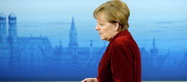 German Chancellor Angela Merkel enters the podium to deliver a speech during the 51st Munich Security Conference (MSC) in Munich - Sputnik International