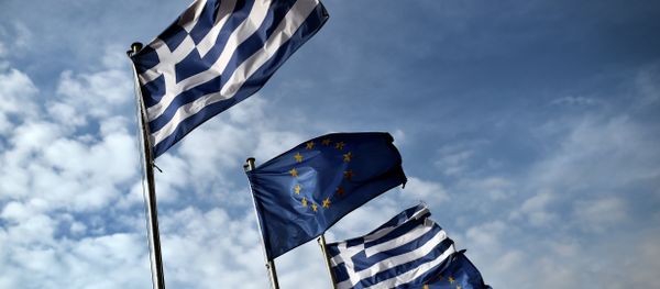 Greek and EU flags wave in the port of the eastern Greek island of Samos in January 20, 2015 Greek and EU flags wave in the port of the eastern Greek island of Samos in January 20, 2015 - Sputnik International