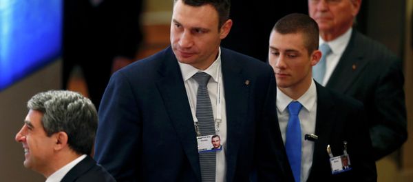Mayor of Kiev Vitali Klitschko (C) arrives for the opening session of the 51st Munich Security Conference at the 'Bayerischer Hof' hotel in Munich Mayor of Kiev Vitali Klitschko (C) arrives for the opening session of the 51st Munich Security Conference at the 'Bayerischer Hof' hotel in Munich - Sputnik International