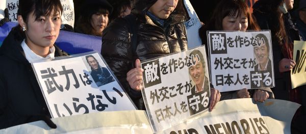 People stage a silent rally for Japanese hostage Kenji Goto called Kenji, You will be alive in our memories near the prime minister's official residence in Tokyo on February 1, 2015 People stage a silent rally for Japanese hostage Kenji Goto called Kenji, You will be alive in our memories near the prime minister's official residence in Tokyo on February 1, 2015 - Sputnik International