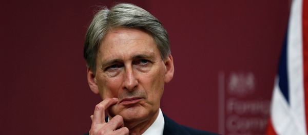 Britain's Foreign Secretary Philip Hammond gestures during a press conference at the Foreign and Commonwealth Office in London - Sputnik International