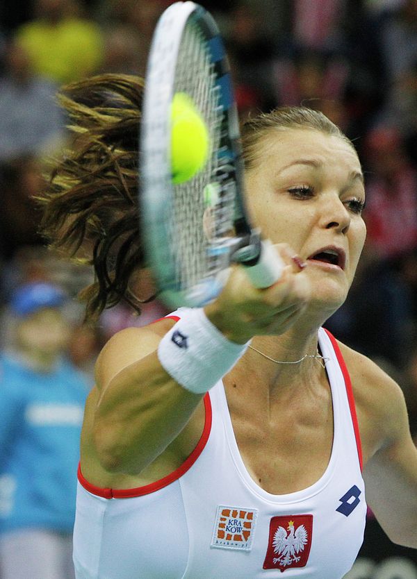 Agnieszka Radwanska of Poland returns the ball to Maria Sharapova of Russia during the Fed Cup World Group first round tennis match between Poland and Russia in Krakow, Poland, Sunday, Feb. 8, 2015 Agnieszka Radwanska of Poland returns the ball to Maria Sharapova of Russia during the Fed Cup World Group first round tennis match between Poland and Russia in Krakow, Poland, Sunday, Feb. 8, 2015 - Sputnik International