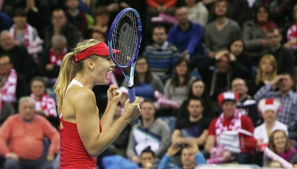 Maria Sharapova of Russia celebrates after winning her match against Agnieszka Radwanska of Poland during the Fed Cup World Group first round tennis match between Poland and Russia in Krakow, Poland, Sunday, Feb. 8, 2015 Maria Sharapova of Russia celebrates after winning her match against Agnieszka Radwanska of Poland during the Fed Cup World Group first round tennis match between Poland and Russia in Krakow, Poland, Sunday, Feb. 8, 2015 - Sputnik International