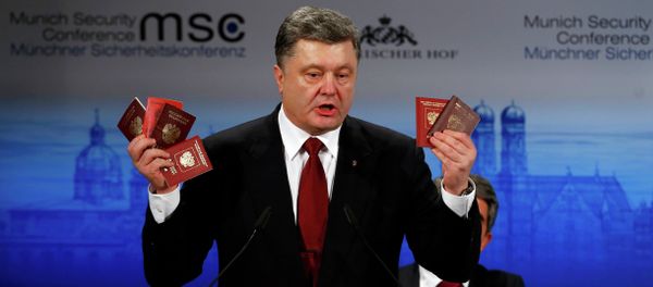 Ukrainian President Petro Poroshenko holds Russian passports meant to prove the presence of Russian troops in Ukraine as he addresses the 51st Munich Security Conference, February 7, 2015 Ukrainian President Petro Poroshenko holds Russian passports meant to prove the presence of Russian troops in Ukraine as he addresses the 51st Munich Security Conference, February 7, 2015 - Sputnik International