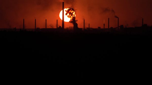 The sun sets over a chemical factory near the city of Donetsk The sun sets over a chemical factory near the city of Donetsk - Sputnik International