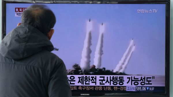 A man watches a TV news program showing the file footage of the missile launch conducted by North Korea, at Seoul Railway Station in Seoul, South Korea, Monday, Feb. 9, 2015 A man watches a TV news program showing the file footage of the missile launch conducted by North Korea, at Seoul Railway Station in Seoul, South Korea, Monday, Feb. 9, 2015 - Sputnik International