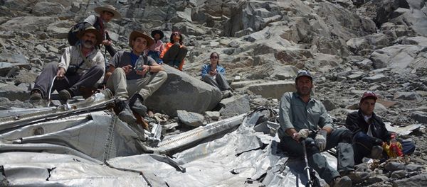 A group of Chilean mountaineers pose for a photo on what they say is the wreckage of a plane that crashed in the Andes 54 years ago A group of Chilean mountaineers pose for a photo on what they say is the wreckage of a plane that crashed in the Andes 54 years ago - Sputnik International