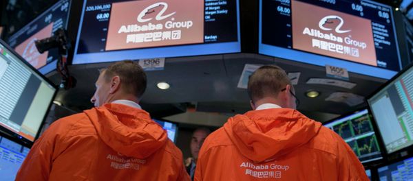 Specialist traders work at the post that trades Alibaba Group Holding Ltd during the company's initial public offering under the ticker BABA at the New York Stock Exchange. Specialist traders work at the post that trades Alibaba Group Holding Ltd during the company's initial public offering under the ticker BABA at the New York Stock Exchange. - Sputnik International