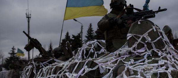 Ukrainian military vehicles drive towards Debaltseve on the outskirts of Artemivsk Ukrainian military vehicles drive towards Debaltseve on the outskirts of Artemivsk - Sputnik International