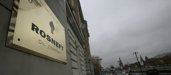A plaque for the Rosneft Oli Company is seen outside the company headquarters in Moscow, Russia, in this file file photo dated Thursday, Oct. 18, 2012 - Sputnik International