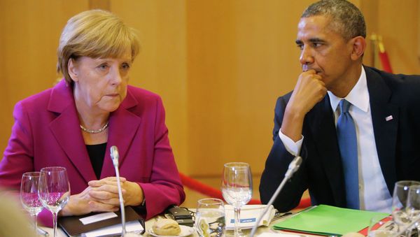 President Obama and Chancellor Merkel seated together at a G7 dinner in Brussels. President Obama and Chancellor Merkel seated together at a G7 dinner in Brussels. - Sputnik International