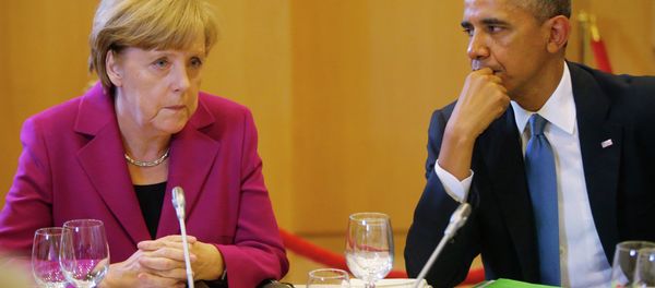 President Obama and Chancellor Merkel seated together at a G7 dinner in Brussels. President Obama and Chancellor Merkel seated together at a G7 dinner in Brussels. - Sputnik International