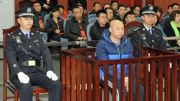 Zhao Zhihong (C), a man who confessed to murdering a woman in China 18 years ago. - Sputnik International