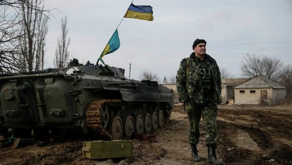 A Ukrainian serviceman is pictured at his position near Debaltseve, eastern Ukraine, February 8, 2015 A Ukrainian serviceman is pictured at his position near Debaltseve, eastern Ukraine, February 8, 2015 - Sputnik International