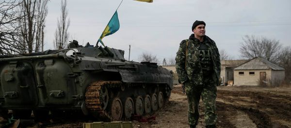 A Ukrainian serviceman is pictured at his position near Debaltseve, eastern Ukraine, February 8, 2015 A Ukrainian serviceman is pictured at his position near Debaltseve, eastern Ukraine, February 8, 2015 - Sputnik International
