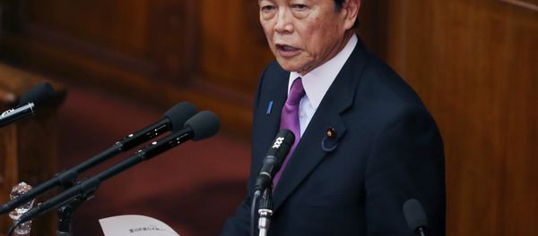 Japan's Finance Minister Taro Aso speaks during a opening session at the lower house of Parliament in Tokyo, Monday, Jan. 26, 2015 Japan's Finance Minister Taro Aso speaks during a opening session at the lower house of Parliament in Tokyo, Monday, Jan. 26, 2015 - Sputnik International