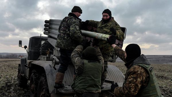 Ukrainian servicemen load Grad rockets outside Debaltsevo, eastern Ukraine February 8, 2015 Ukrainian servicemen load Grad rockets outside Debaltsevo, eastern Ukraine February 8, 2015 - Sputnik International