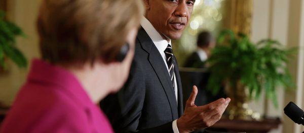 U.S. President Barack Obama speaks during a joint news conference with German Chancellor Angela Merkel in the East Room of the White House in Washington February 9, 2015 U.S. President Barack Obama speaks during a joint news conference with German Chancellor Angela Merkel in the East Room of the White House in Washington February 9, 2015 - Sputnik International