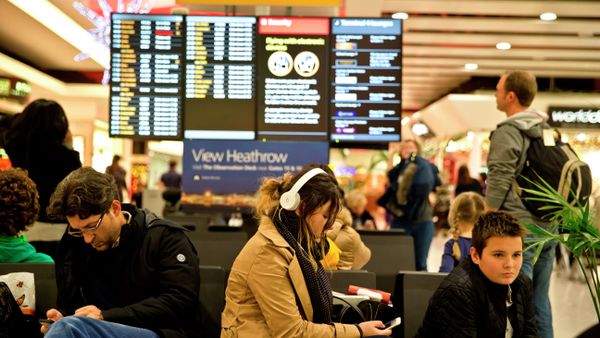 Passengers wait at Heathrow Airport in London, Friday, Dec. 12, 2014. Passengers wait at Heathrow Airport in London, Friday, Dec. 12, 2014. - Sputnik International
