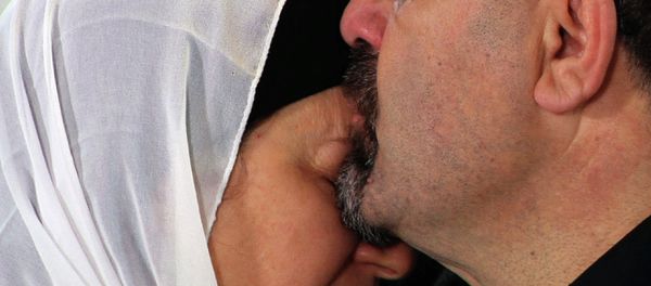 Namee Barakat hugs a female relative during a news conference in Raleigh, N.C., about the death of his son, Deah, his daughter-in-law and her sister on Wednesday, Feb. 11, 2015. Namee Barakat hugs a female relative during a news conference in Raleigh, N.C., about the death of his son, Deah, his daughter-in-law and her sister on Wednesday, Feb. 11, 2015. - Sputnik International