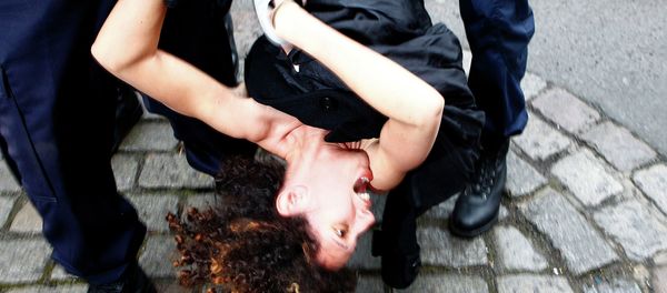 A Femen activist is taken away by police officers as she protests Tuesday, Feb. 10, 2015 in front of the Lille courthouse in Lille, northern France, where Dominique Strauss-Kahn goes on trial for sex charges in France. A Femen activist is taken away by police officers as she protests Tuesday, Feb. 10, 2015 in front of the Lille courthouse in Lille, northern France, where Dominique Strauss-Kahn goes on trial for sex charges in France. - Sputnik International