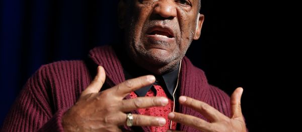 comedian Bill Cosby performs at the Stand Up for Heroes event at Madison Square Garden in New York. Three women who claim they were victimized by Cosby are scheduled to appear at a news conference called by attorney Gloria Allred, on Wednesday, Dec. 3, 2014. - Sputnik International