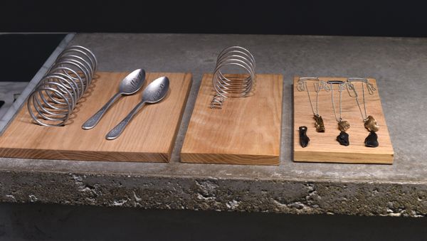 A sample of some of the jewelry on display at Curve New York February 11, 2015 from Article22, a brand that designs jewelry from recycled Vietnam War bombs. - Sputnik International