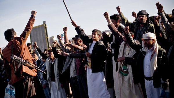 Houthi Shiite Yemenis chant slogans during a rally to show support for their comrades in Sanaa, Yemen, Wednesday, Jan. 28, 2015 Houthi Shiite Yemenis chant slogans during a rally to show support for their comrades in Sanaa, Yemen, Wednesday, Jan. 28, 2015 - Sputnik International