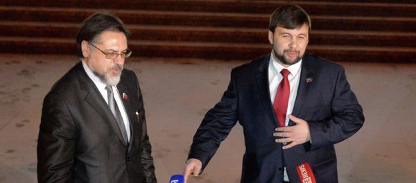 Representatives of the Donetsk and Lugansk people's republics Denis Pushilin and Vladislav Deinego (from right to left) Representatives of the Donetsk and Lugansk people's republics Denis Pushilin and Vladislav Deinego (from right to left) - Sputnik International