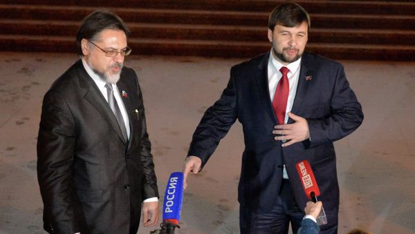 Representatives of the Donetsk and Lugansk people's republics Denis Pushilin and Vladislav Deinego (from right to left) - Sputnik International