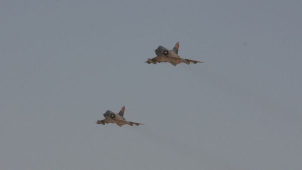 Two Egyptian Air Force Mirage fighter jets execute a bombing run Two Egyptian Air Force Mirage fighter jets execute a bombing run - Sputnik International