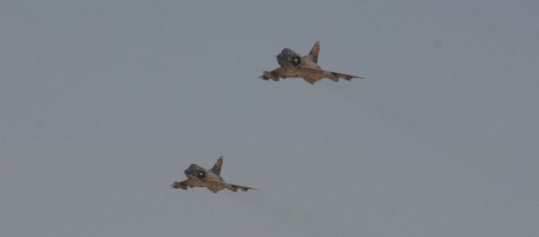 Two Egyptian Air Force Mirage fighter jets execute a bombing run Two Egyptian Air Force Mirage fighter jets execute a bombing run - Sputnik International