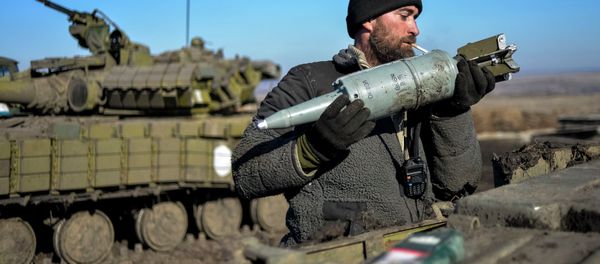 A Ukrainian serviceman loads ammunition into a tank in the territory controlled by Ukraine's government forces, Donetsk region February 13, 2015 A Ukrainian serviceman loads ammunition into a tank in the territory controlled by Ukraine's government forces, Donetsk region February 13, 2015 - Sputnik International