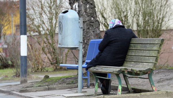 A woman refugee sits on a bench in the Marienfelde Refugee Transit Center in South Berlin, on January 29, 2015 A woman refugee sits on a bench in the Marienfelde Refugee Transit Center in South Berlin, on January 29, 2015 - Sputnik International