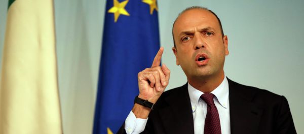 In this Friday, Oct. 31, 2014 file photo, Italian Interior Minister Angelino Alfano meets journalists during a press conference to present the EU 'Tritone' migrants rescue mission, in Rome's Palazzo Chigi government office - Sputnik International