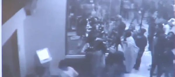 Screenshot of security camera footage from a Florida theater in which 900 teens rampaged through for free movies Screenshot of security camera footage from a Florida theater in which 900 teens rampaged through for free movies - Sputnik International