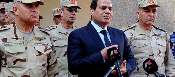 Egyptian President Abdel Fattah al-Sisi (C) talks to the media next to top military generals after an emergency meeting of the Supreme Council of the armed Forces in Cairo, in this January 31, 2015 Egyptian President Abdel Fattah al-Sisi (C) talks to the media next to top military generals after an emergency meeting of the Supreme Council of the armed Forces in Cairo, in this January 31, 2015 - Sputnik International
