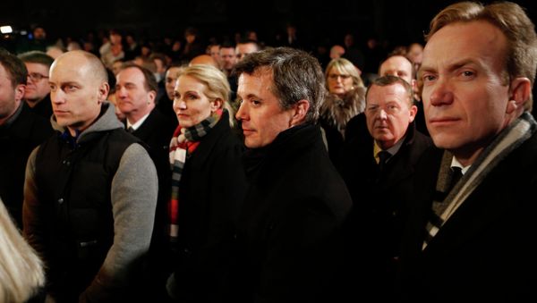Danish Prime Minister Helle Thorning-Schmidt (3rd L), her husband Stephen Kinnock (L), Crown Prince Frederik (C), Liberal leader Lars Lokke Rasmussen (2nd R) and Norwegian Foreign Minister Borge Brende (R) stand together during a memorial service for victims of deadly attacks on a synagogue and an event promoting free speech, in Copenhagen February 16, 2015 Danish Prime Minister Helle Thorning-Schmidt (3rd L), her husband Stephen Kinnock (L), Crown Prince Frederik (C), Liberal leader Lars Lokke Rasmussen (2nd R) and Norwegian Foreign Minister Borge Brende (R) stand together during a memorial service for victims of deadly attacks on a synagogue and an event promoting free speech, in Copenhagen February 16, 2015 - Sputnik International