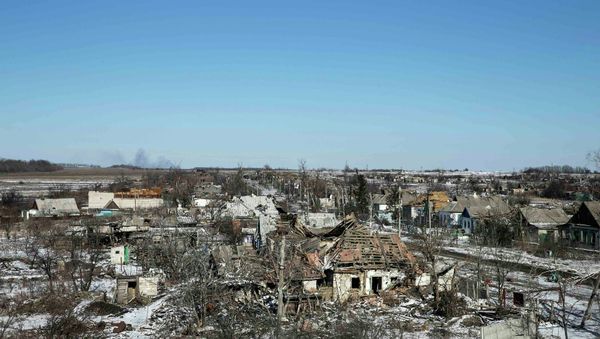 Buildings damaged by fighting are pictured in the village of Nikishine, south east of Debaltseve February 17, 2015 Buildings damaged by fighting are pictured in the village of Nikishine, south east of Debaltseve February 17, 2015 - Sputnik International