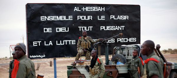 The sign , a reminder of Islamic extremists, reads Al Hesbah, together for the pleasure of God almighty and the struggle against sins. The sign , a reminder of Islamic extremists, reads Al Hesbah, together for the pleasure of God almighty and the struggle against sins. - Sputnik International