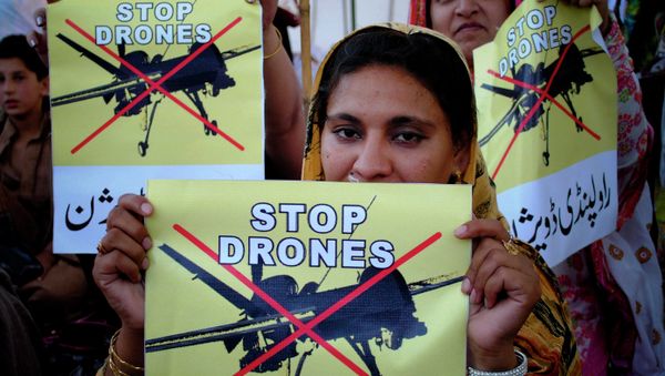 Pakistani women rally against the US drone strikes in tribal areas. Pakistani women rally against the US drone strikes in tribal areas. - Sputnik International