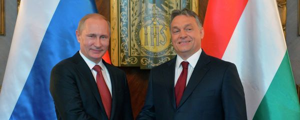 Russian President Vladimir Putin, left, and Hungarian Prime Minister Viktor Orban shake hands during their meeting at the parliament building in Budapest Russian President Vladimir Putin, left, and Hungarian Prime Minister Viktor Orban shake hands during their meeting at the parliament building in Budapest - Sputnik International