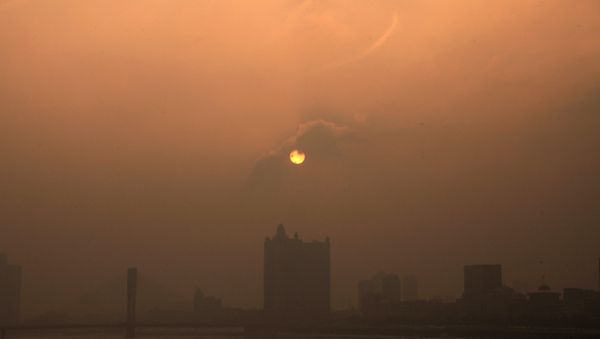 This picture taken on January 29, 2013 shows a general view of buildings in the heavy smog in Jilin, northeast China's Jilin province - Sputnik International