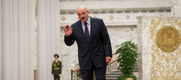 BelarusPresident, Alexander Lukashenko, greets journalists as he comes to attend the arrival ceremony in Minsk, Belarus, Wednesday, Feb. 11, 2015 BelarusPresident, Alexander Lukashenko, greets journalists as he comes to attend the arrival ceremony in Minsk, Belarus, Wednesday, Feb. 11, 2015 - Sputnik International