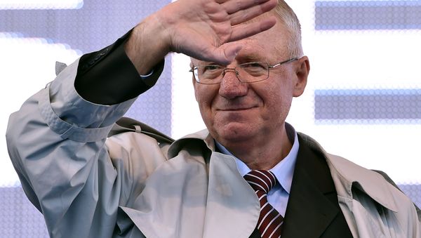 Serbian nationalist politician Vojislav Seselj waves to his supporters during an anti-government rally in Belgrade on November 15, 2014 Serbian nationalist politician Vojislav Seselj waves to his supporters during an anti-government rally in Belgrade on November 15, 2014 - Sputnik International