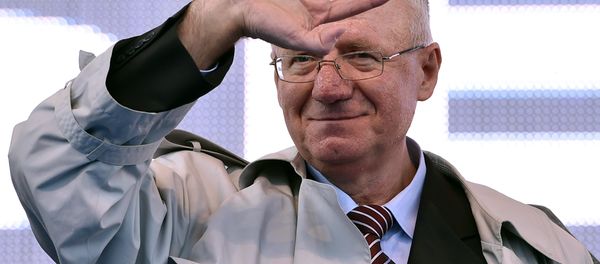 Serbian nationalist politician Vojislav Seselj waves to his supporters during an anti-government rally in Belgrade on November 15, 2014 Serbian nationalist politician Vojislav Seselj waves to his supporters during an anti-government rally in Belgrade on November 15, 2014 - Sputnik International