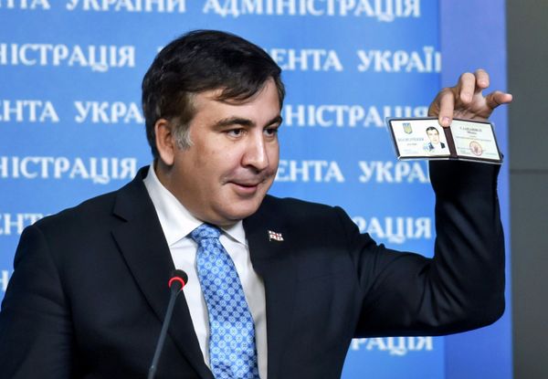 Former Georgia's President Mikheil Saakashvili shows off his identification card as the head of an advisory council in Kiev, in this February 17, 2015 handout photo supplied by the Ukrainian Presidential Press Service - Sputnik International