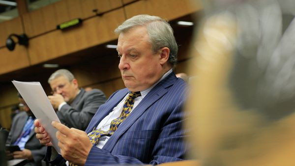 Russia's ambassador to the International Atomic Energy Agency (IAEA) Grigory Berdennikov reads documents Russia's ambassador to the International Atomic Energy Agency (IAEA) Grigory Berdennikov reads documents - Sputnik International