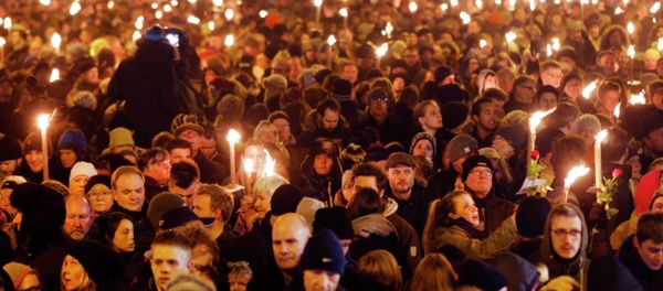 Hundreds of people gather for a vigil near the cultural club in Copenhagen, Denmark Hundreds of people gather for a vigil near the cultural club in Copenhagen, Denmark - Sputnik International