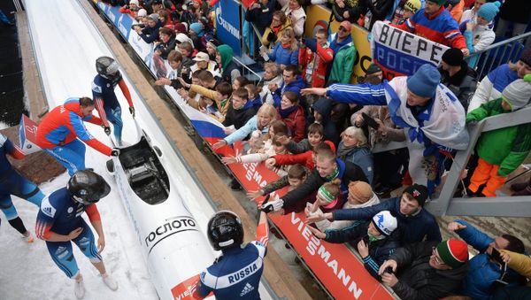 Nikita Zakharov, Maxim Mokrousov, Kirill Antyukh and Vasily Kondratenko (Russia) at the finish of a heat during the four man bob event at the Bobsleigh World Cup 8 in Sochi - Sputnik International
